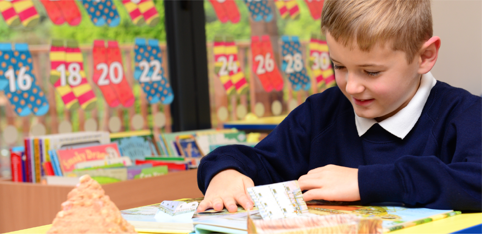 boy learning from a book